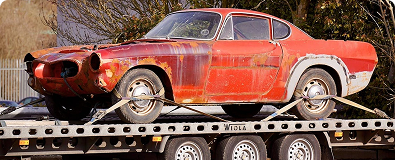 Damaged vehicle on a trailer