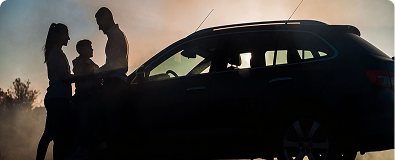 Vehicle with people standing nearby